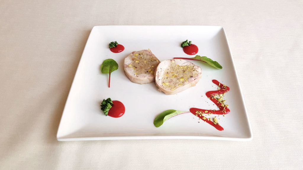 Rabbit Rotolo The specialities of the chef: filled rabbit roll with pomegranate sauce ...